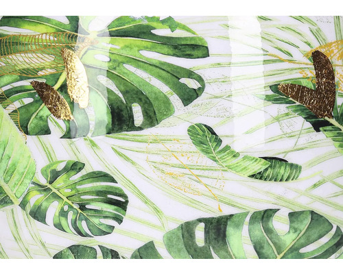 Décor avec feuilles de Monstera et motifs dorés