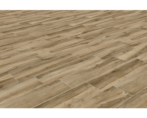 Sol posé avec des carreaux imitation bois.