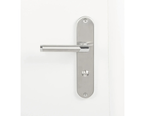 Edelstahl Türdrücker mit Langschild auf weißer Tür