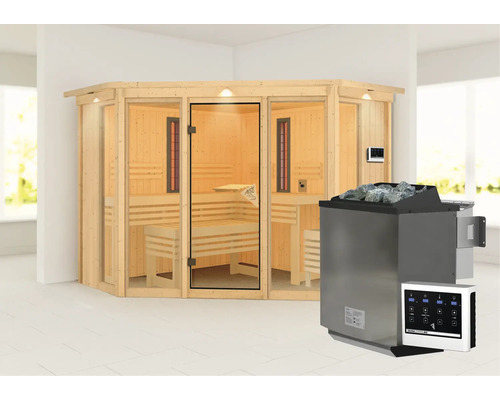 Sauna mit Saunaofen und Saunasteinen in einem hellen Raum