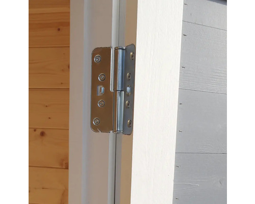 Vue détaillée d''une charnière de porte sur une porte en bois