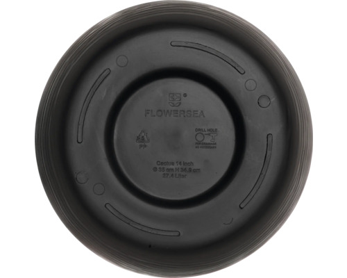 Unterseite des Blumentopfs mit Herstellerinformationen und Bohranleitung