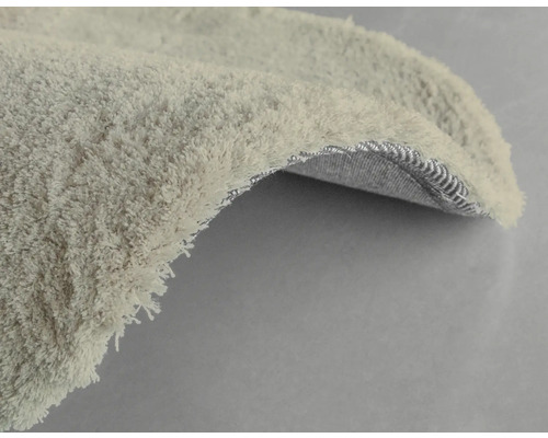 Detailansicht eines Teppichs mit hohem Flor