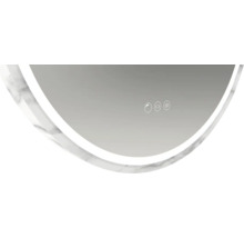 Vue détaillée d''un miroir rond avec fonction tactile et cadre à l''aspect marbré