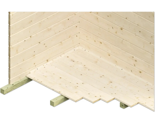 Vue détaillée du plancher en bois et du mur en bois d''une cabane de jardin.
