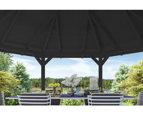 Vue intérieure d''un pavillon de jardin avec une table dressée dans le jardin