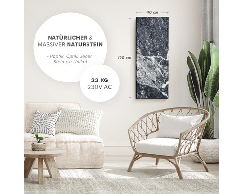 Salon avec panneau en pierre naturelle, fauteuil et canapé