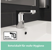 Sensorarmatur auf einem Waschbecken mit Symbol für Sensoraktivierung