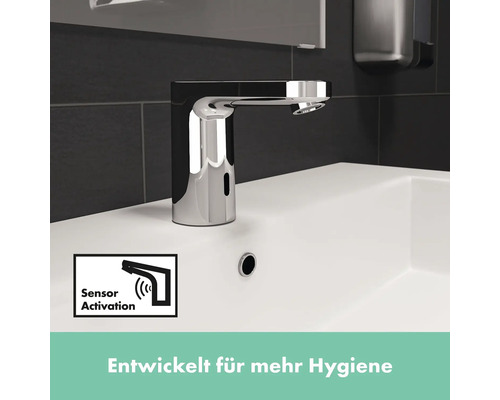 Sensorarmatur auf einem Waschbecken mit Symbol für Sensoraktivierung