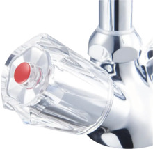 Robinet avec poignée transparente et bouton rouge
