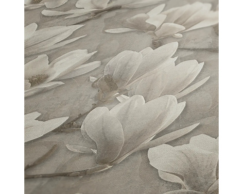 Gros plan d''un papier peint avec un motif de fleurs de magnolia