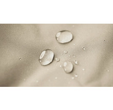 Gros plan de gouttes d''eau sur un tissu hydrofuge