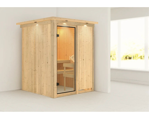 Sauna en bois avec porte en verre et éclairage intérieur