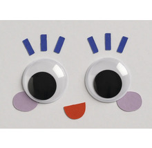 Visage avec des yeux globuleux et des formes en papier