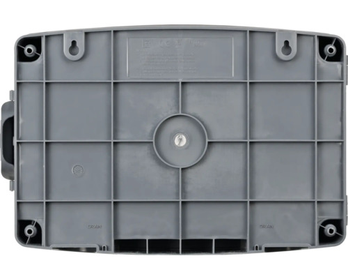 Unterseite eines Verteilerkastens aus Kunststoff mit Montagevorrichtungen und Drainageöffnungen