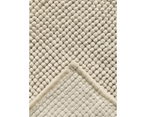 Vue détaillée d''un tapis de bain avec structure à picots