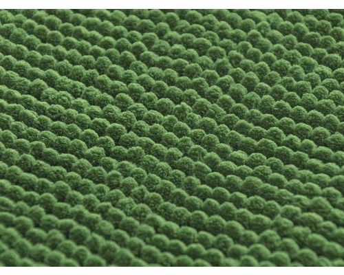 Gros plan d''un tapis en chenille vert