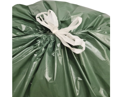 Sac poubelle vert plein avec lien de fermeture