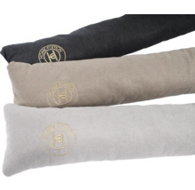 Trois bourrelets de porte en tissu avec le logo Home Edition