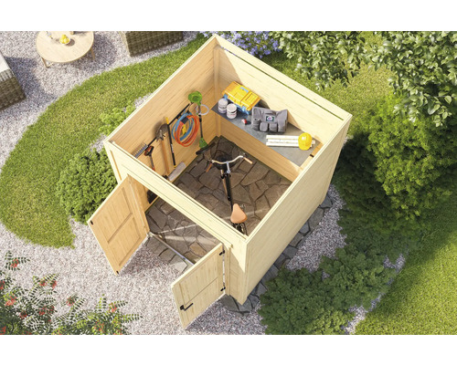 Abri de jardin en bois avec outils de jardin et vélo dans le jardin