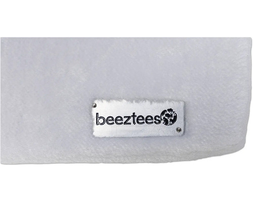 Logo Beeztees sur un lit pour chien moelleux