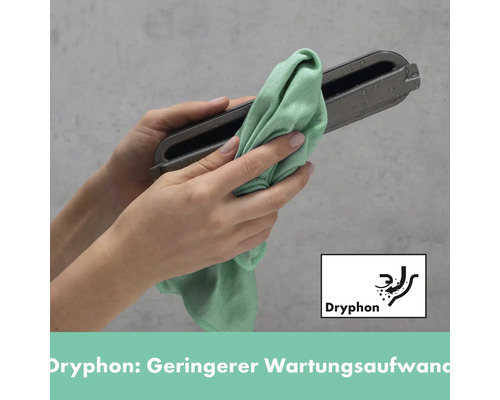 Eine Person reinigt mit einem Tuch ein Dryphon-Produkt.