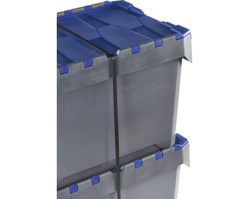 Deux boîtes en plastique grises avec couvercle bleu et sangle d''arrimage empilées