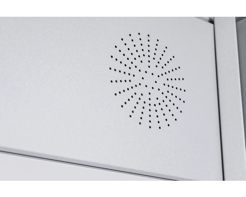 Gros plan d''une armoire métallique avec une surface perforée pour la ventilation