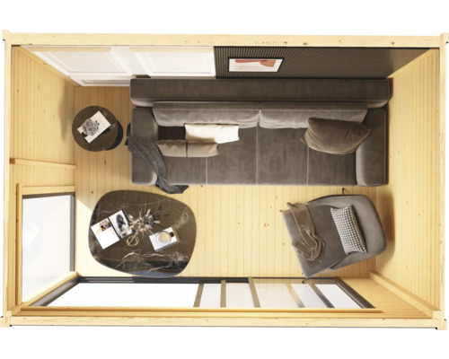 Vue intérieure d'une maison en bois avec canapé, fauteuil et tables