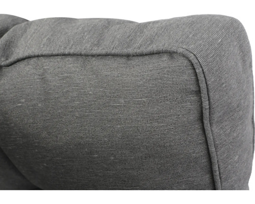 Gros plan d''un coussin de canapé gris