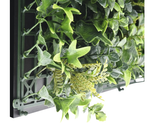 Mur végétal artificiel avec différentes feuilles vertes