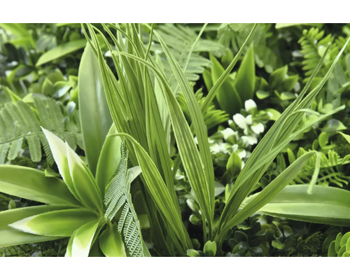 Mur végétal artificiel vert avec différentes feuilles