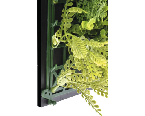 Gros plan d''un mur végétal artificiel avec système de fixation