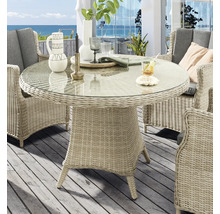 Table de jardin ronde avec plateau en verre et base en rotin avec chaises assorties