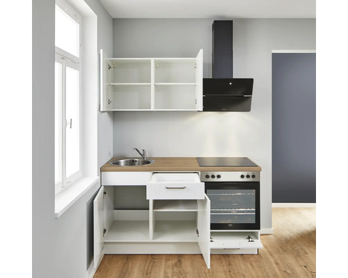 Cuisine compacte avec évier, cuisinière, hotte aspirante et armoires pour petits espaces