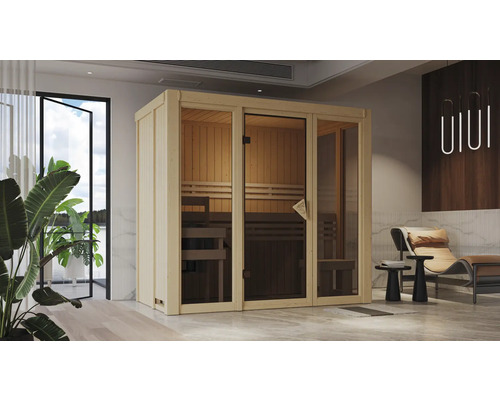 Sauna en bois avec porte en verre dans une pièce aménagée de façon moderne.