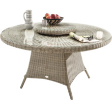 Table de jardin ronde avec plateau en verre et aspect rotin