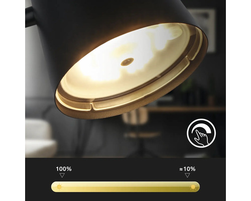 Gros plan d''une lampe noire avec fonction de variateur et contrôle de la luminosité