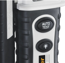 Gros plan d''un testeur de tension avec bouton ''Auto Test'' et symbole de lampe