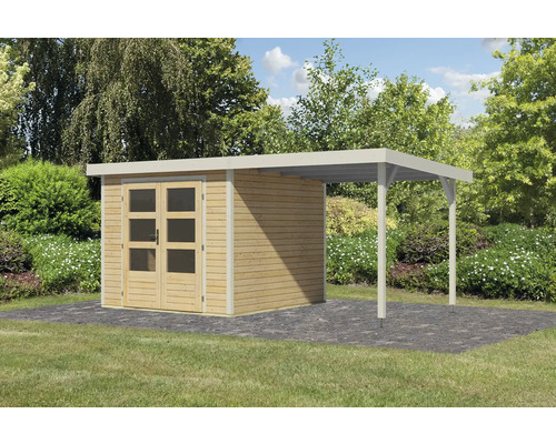 Abri de jardin avec annexe et double porte sur pelouse