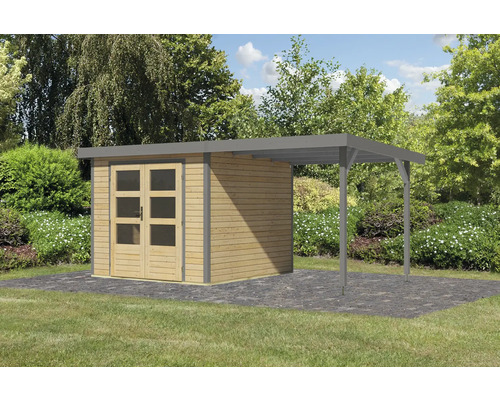 Abri de jardin avec carport en bois sur une pelouse