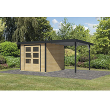 Abri de jardin avec extension sur une pelouse