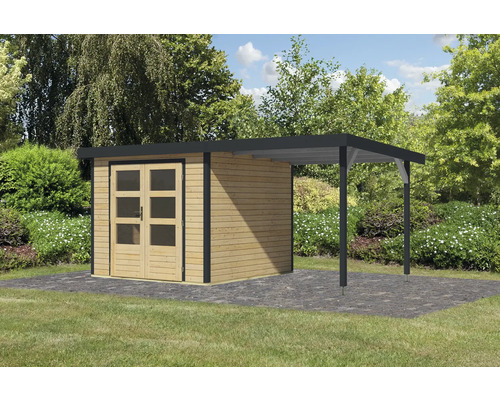 Abri de jardin avec extension sur une pelouse