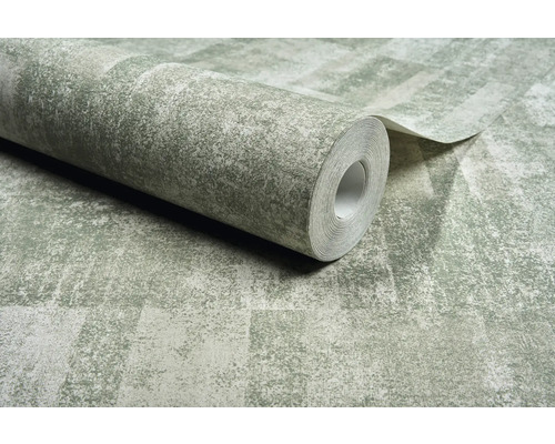 Un rouleau de papier peint avec un motif abstrait.