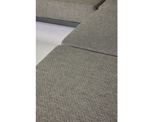 Detailaufnahme eines grauen Sofas mit Textilbezug