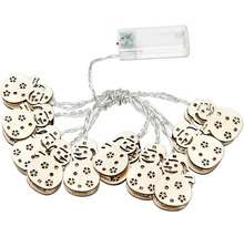 Guirlande lumineuse avec motifs de bonhommes de neige en bois