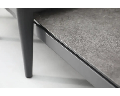 Vue détaillée d'une table de jardin avec pied de table et plateau en pierre