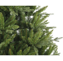 Gros plan sur un arbre de Noël artificiel avec des aiguilles vertes