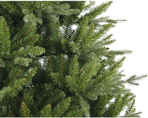 Gros plan sur un arbre de Noël artificiel avec des aiguilles vertes