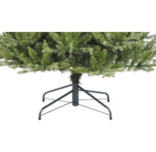 Gros plan sur un sapin de Noël artificiel avec pied en métal